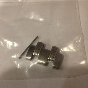 Omega Seamaster stainless steel link and pen